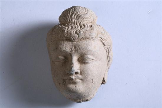 Appraisal: GANDHARAN GREY SCHIST HEAD OF BUDDHA circa th century -