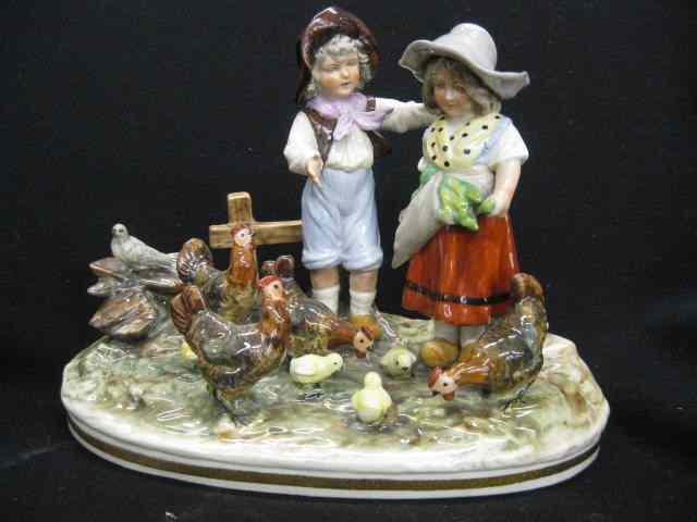 Appraisal: Dresden Porcelain Figurine of Young Boy Girl feeding chickens ''