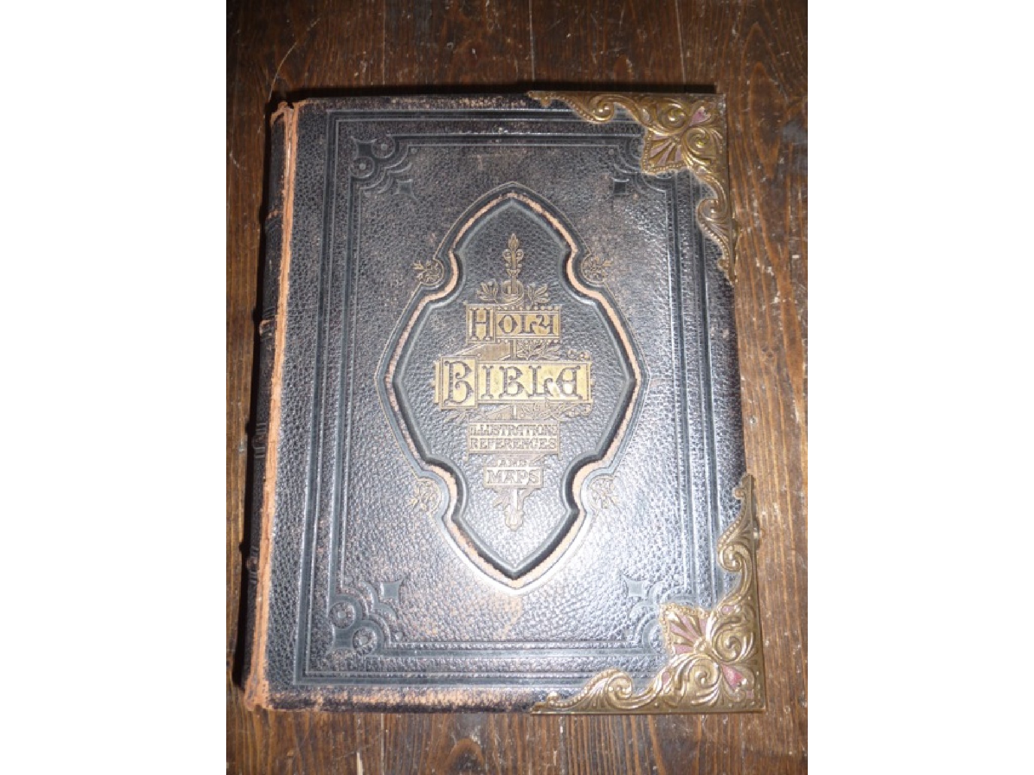 Appraisal: A substantial Victorian black leather and brass bound Holy Bible