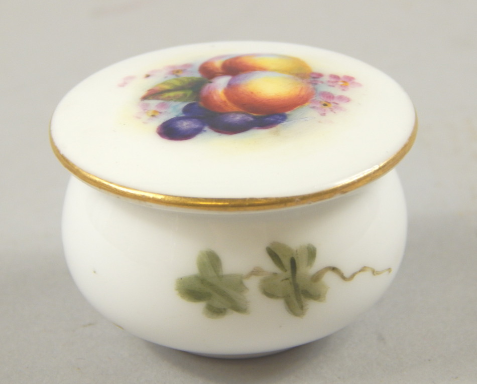 Appraisal: A Royal Worcester miniature jar and cover the top painted