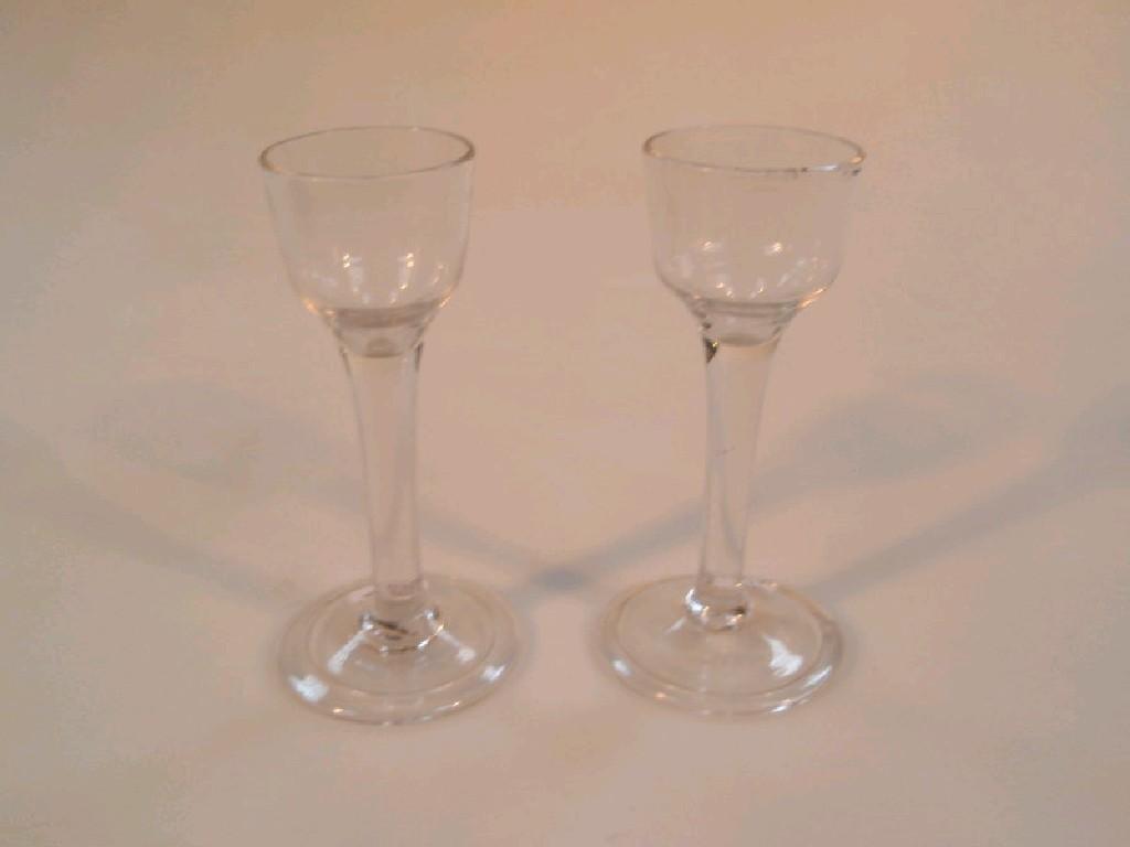 Appraisal: Two mid thC wine glasses with plain oge bowls and