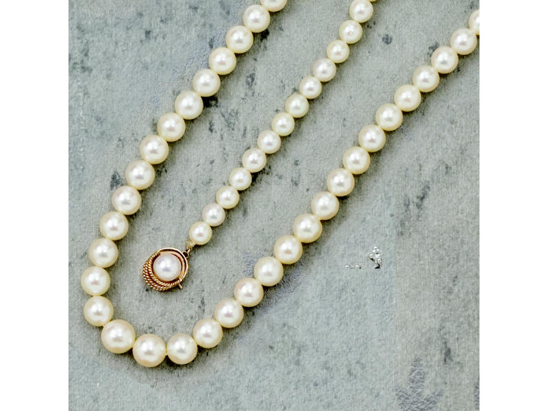 Appraisal: GRADUATED PEARL NECKLACE Cream color cultured pearls with very good