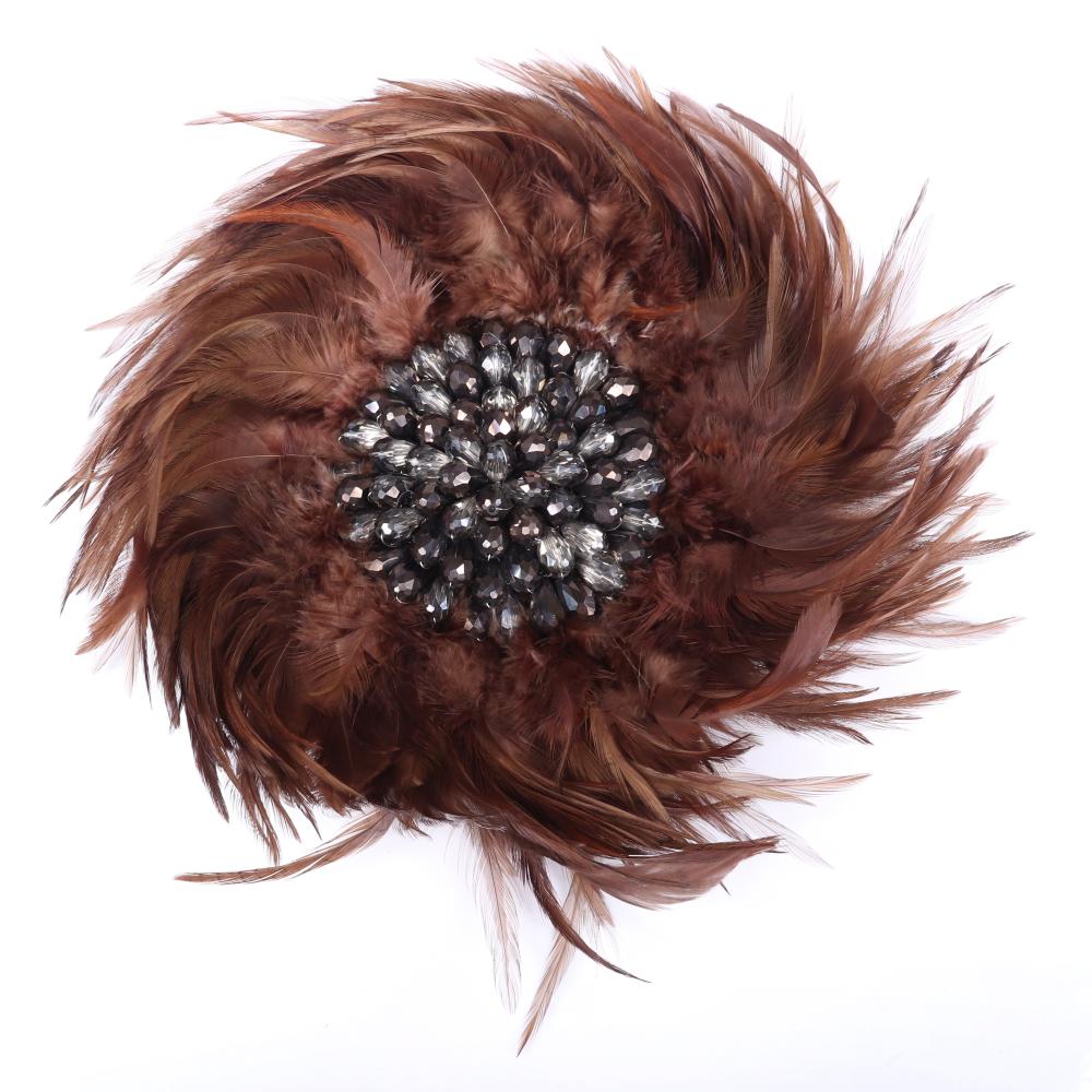 Appraisal: VINTAGE ENORMOUS MAGNETIC COUTURE BROOCH PIN WITH BROWN SPIRALING FEATHERS