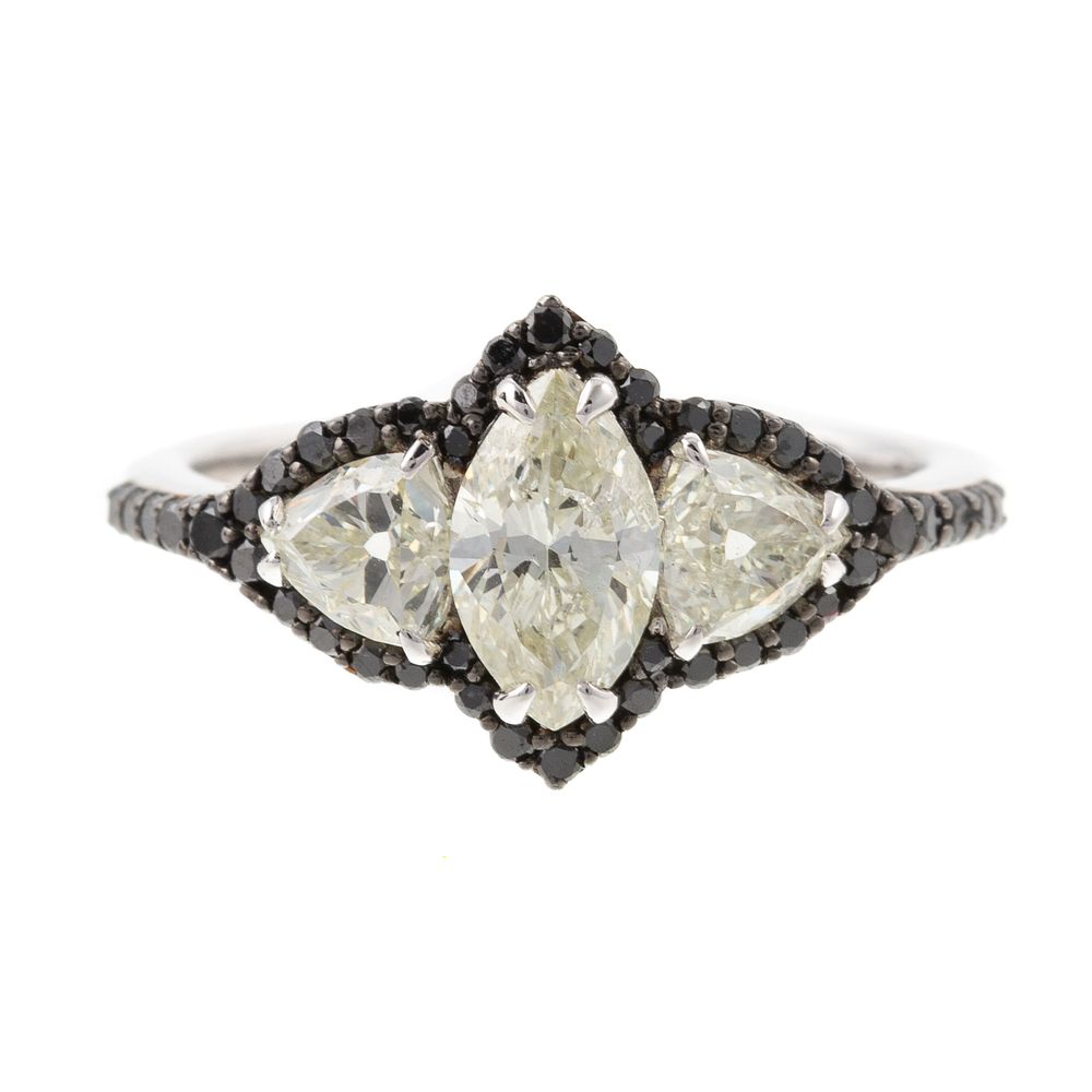 Appraisal: An K Diamond Ring with Black Diamond Accents K white