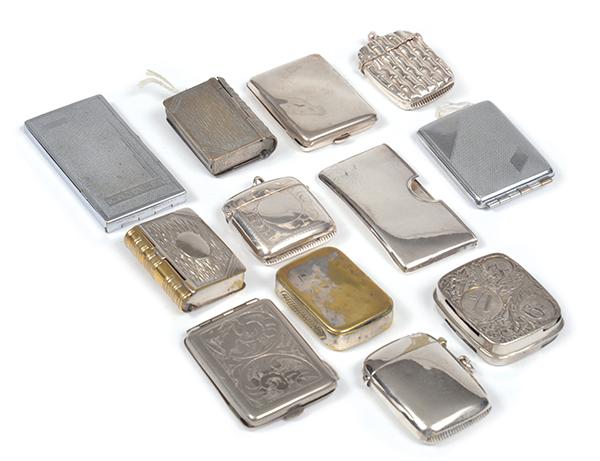 Appraisal: A COLLECTION OF TWELVE SILVER PLATE AND SILVER-COLOURED CARD HOLDERS