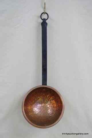 Appraisal: Antique Hammered Copper LadleHas a cast iron ladle handle with