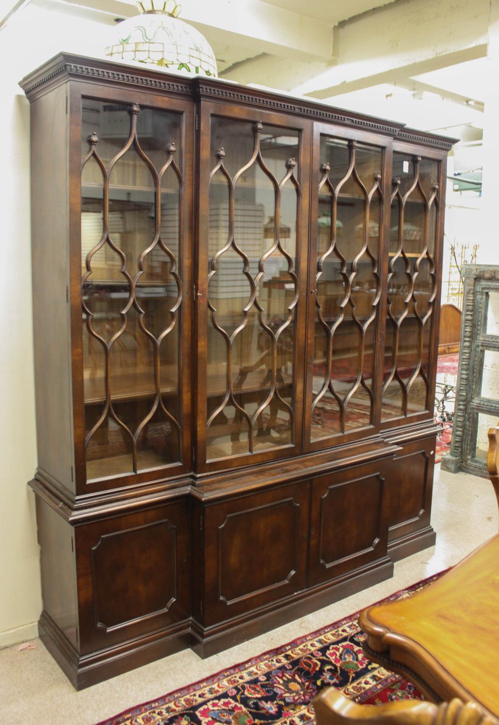 Appraisal: GEORGE III STYLE MAHOGANY BREAKFRONT BOOKCASE American th century in