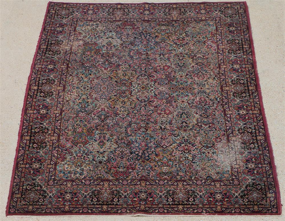 Appraisal: LARGE KIRMAN MULTI COLORED ORIENTAL RUG having red pink blues