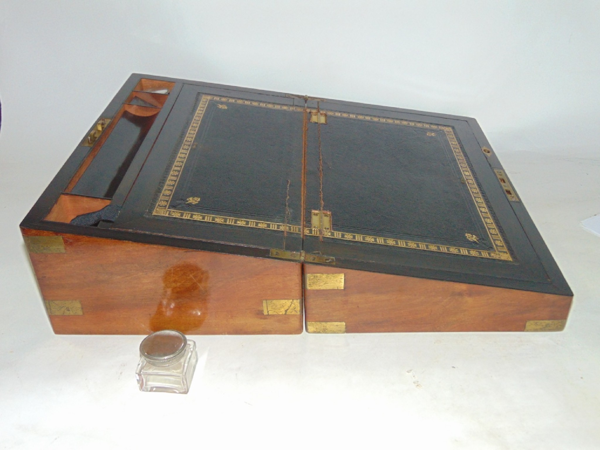 Appraisal: A th century walnut veneered writing slope with banded corners