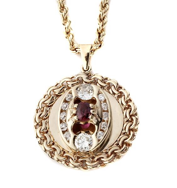 Appraisal: A diamond ruby and k gold pendant with k gold