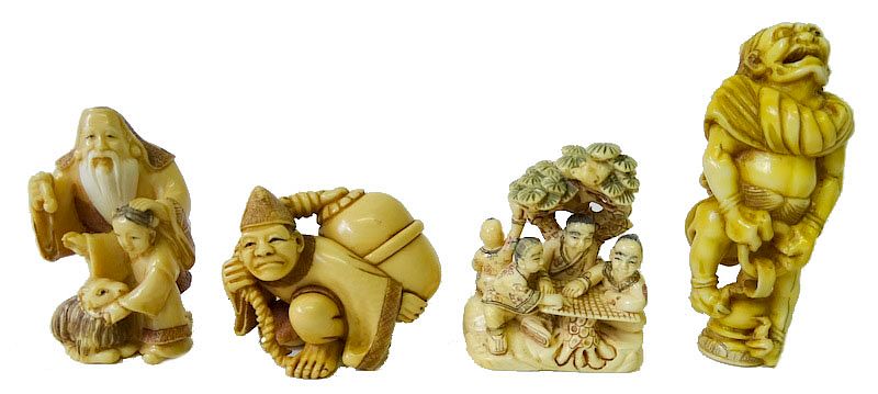 Appraisal: Four Chinese Carved Netsuke Groups Four Chinese Carved Ivory Netsuke