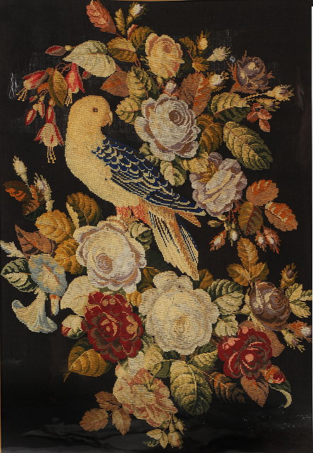 Appraisal: A VICTORIAN NEEDLEPOINT PANEL of a parrot perched amidst Summer