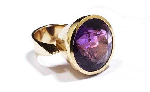 Appraisal: GOLD AND AMETHYST RING ca Yellow gold Decorative solid ring