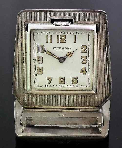 Appraisal: A s Eterna silvery metal cased travelling timepiece the mm