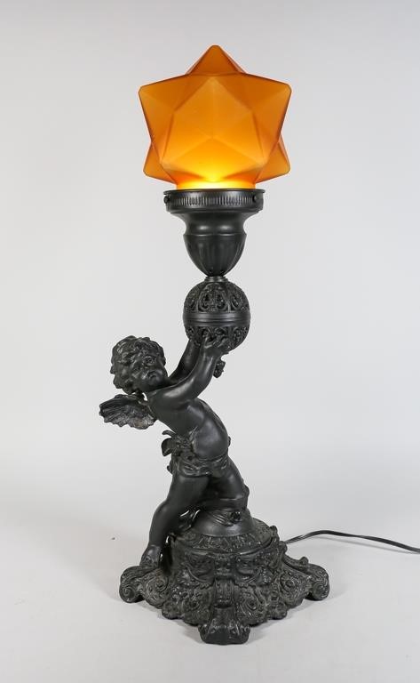 Appraisal: METAL CHERUB TABLE LAMP WITH TORCH SHADEMetal cherub table lamp