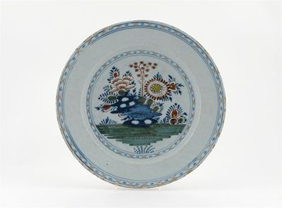 Appraisal: A large Delftware dish painted in shades of blue green