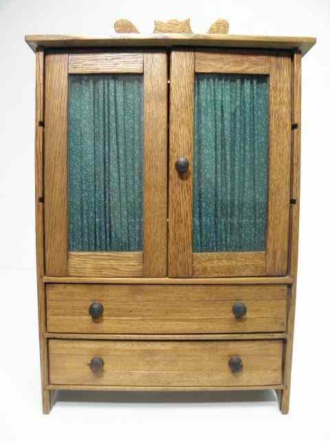 Appraisal: Antique wooden miniature wardrobe cabinet Two doors at the front