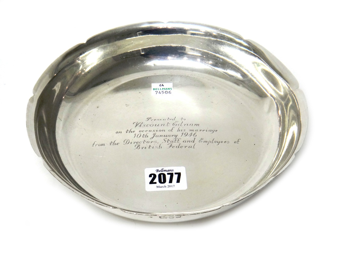 Appraisal: A silver shaped circular dish presentation inscribed to the centre