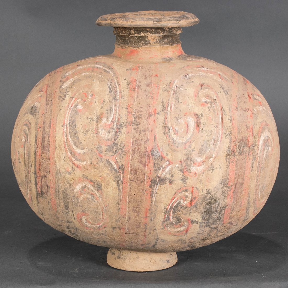 Appraisal: HAN DYNASTY PAINTED POTTERY COCOON VASE Han dynasty painted terra