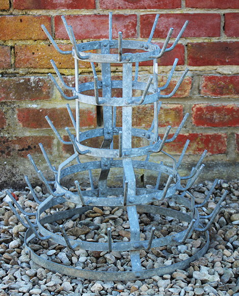 Appraisal: AN OLD GALVANIZED SIX-TIERED BOTTLE TREE approximately cm tall overall