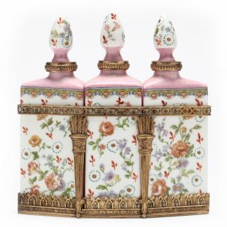 Appraisal: French Porcelain Perfume Bottle Set circa transfer and paint decorated