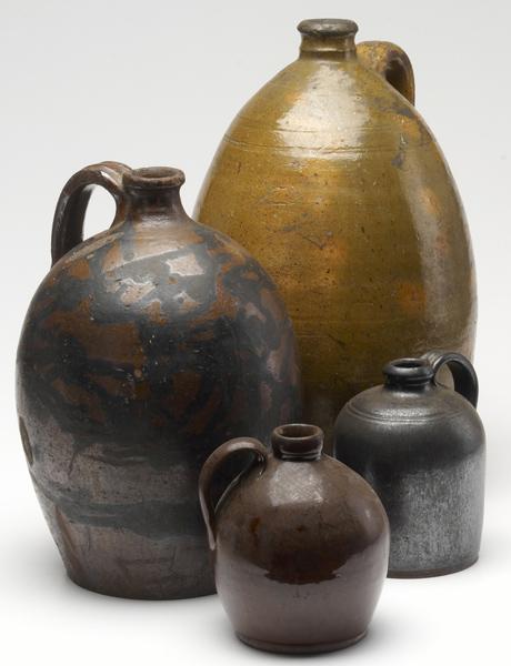 Appraisal: REDWARE Four th C redware jugs Tallest