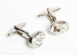 Appraisal: A pair of white metal cufflinks with synthetic gemstone detail