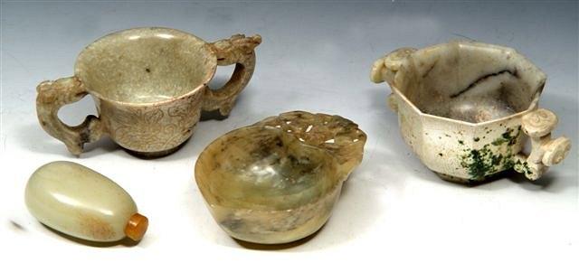 Appraisal: A JADE SIDE HANDLED CUP of heart shaped form with