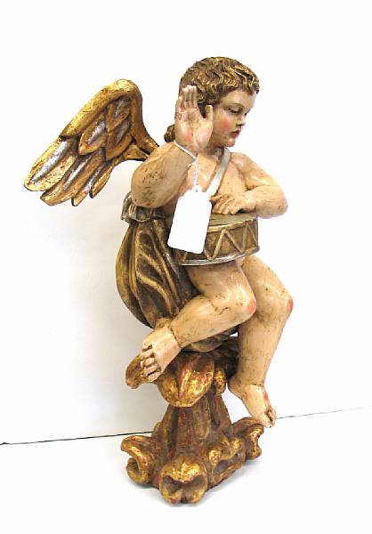 Appraisal: A Spanish colonial style polychrome carved wood figure of an