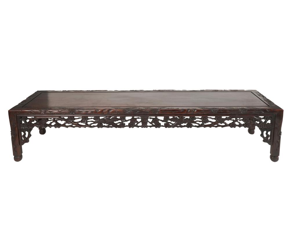 Appraisal: CHINESE CARVED WOOD LOW TABLEwith pierced floral apron Condition minor