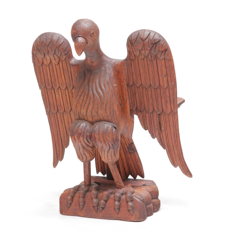 Appraisal: Mid th century Hand carved wooden eagle with dark surface