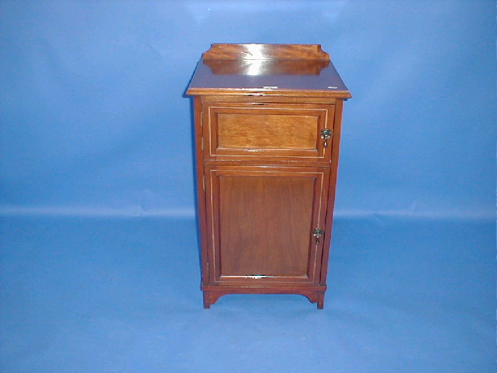 Appraisal: An Edwardian mahogany pot cupboard