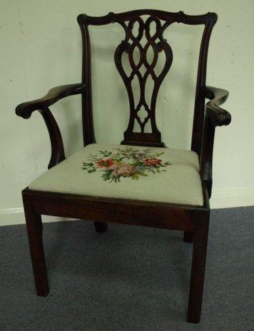 Appraisal: A late th Century mahogany armchair with pierced upright splat