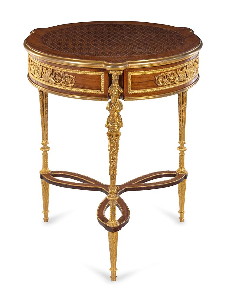 Appraisal: A Louis XVI Style Gilt Metal Mounted Parquetry Table A