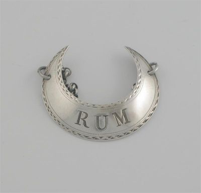 Appraisal: A George III bright-cut crescent label incised 'RUM' by Peter