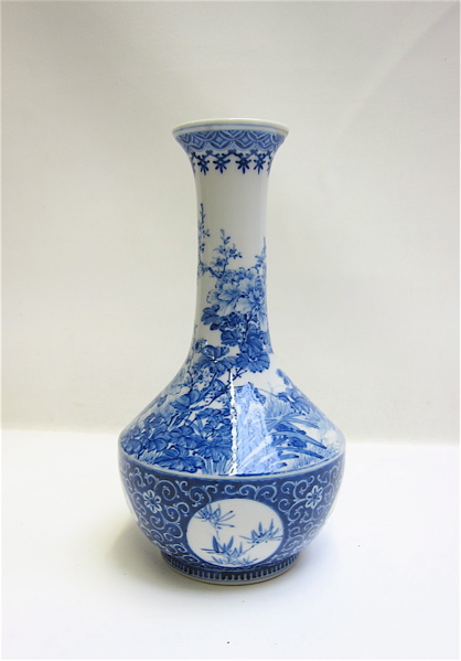 Appraisal: MEIJI JAPANESE BLUE AND WHITE GLAZED VASE in bottle form