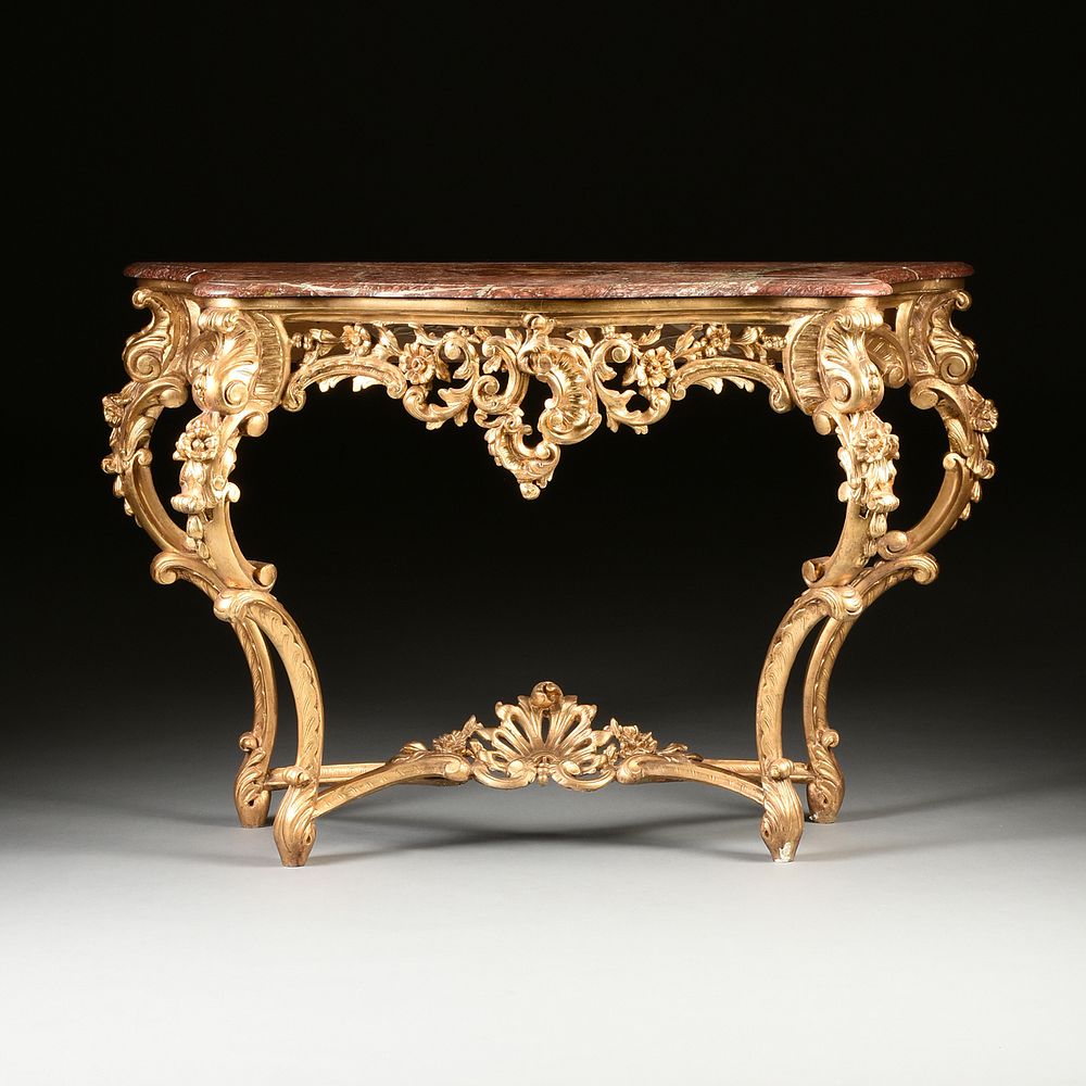 Appraisal: A ROCOCO REVIVAL MARBLE TOPPED AND PARCEL GILT CARVED WOOD