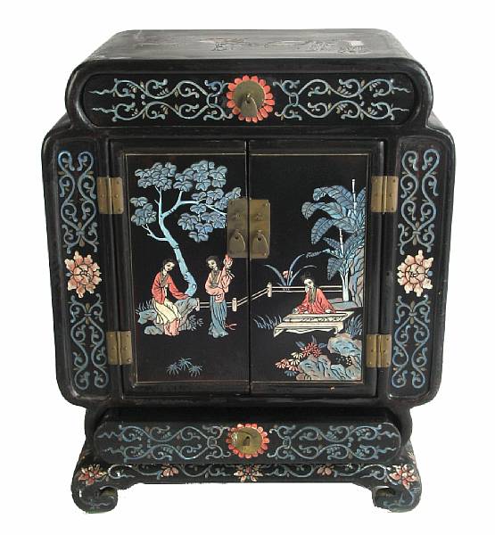 Appraisal: A Chinese polychrome lacquer small cabinet height in width in