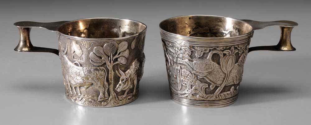 Appraisal: Pair Vapheio Style English Silver Cups Chester England one with