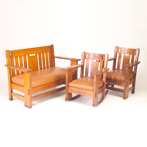 Appraisal: CHARLES STICKLEY Three-piece parlor set with loveseat armchair and rocker