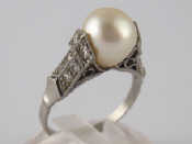 Appraisal: A platinum diamond and untested pearl ring the pearl slightly