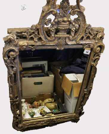 Appraisal: Gilt Oval Mantle Mirror with Urn Decoration MIR