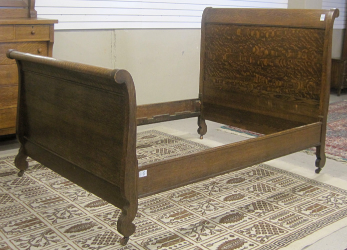 Appraisal: OAK SLEIGH BED WITH RAILS Empire Revival style American c