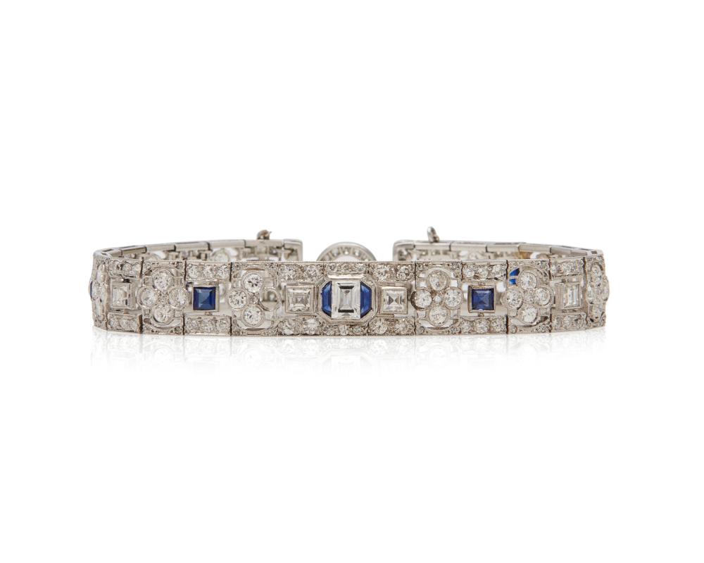 Appraisal: Platinum Diamond and Sapphire Bracelet the open-work bracelet centering an