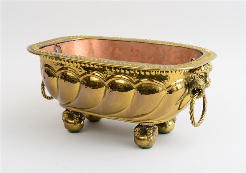 Appraisal: BAROQUE STYLE REPOUSS BRASS JARDINI RE The oval everted reeded