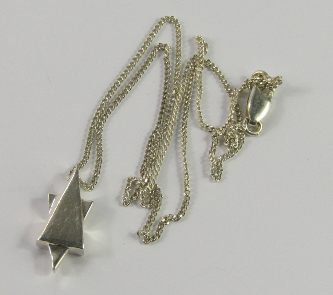 Appraisal: A Gucci silver star shaped pendant on chain boxed