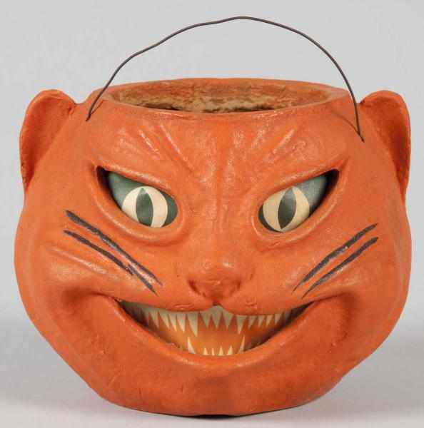 Appraisal: Pulp Halloween Orange Siamese Cat Jack-O-Lantern Description Original paper inserts