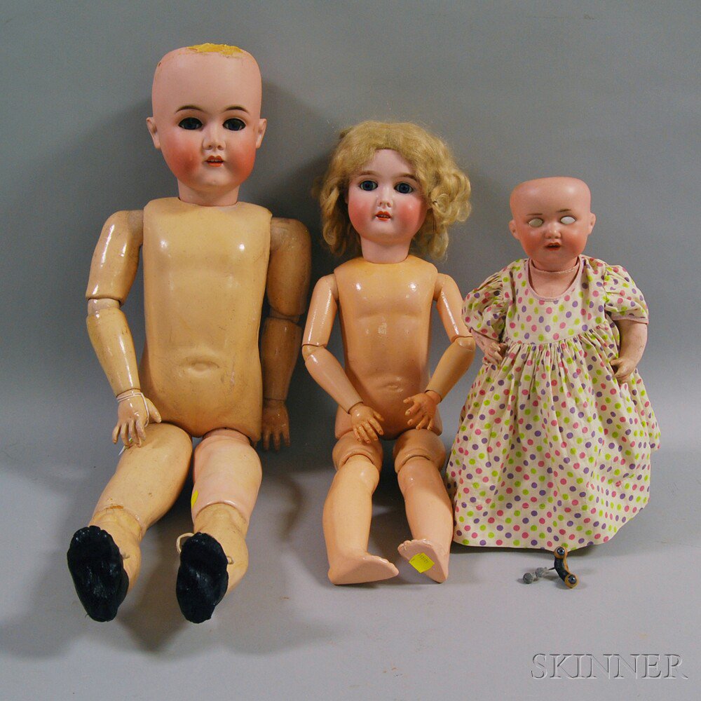 Appraisal: Three German Bisque Head Dolls an AW Special doll with