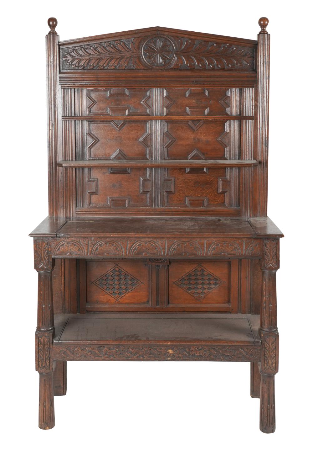 Appraisal: JACOBEAN REVIVAL CARVED OAK SIDEBOARDthe hinged top concealing a storage