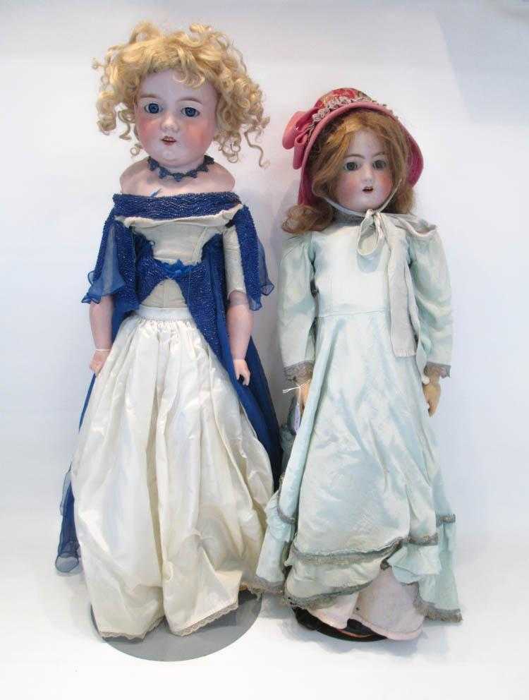 Appraisal: TWO GERMAN BISQUE HEAD DOLLS including an Armand Marseille shoulder